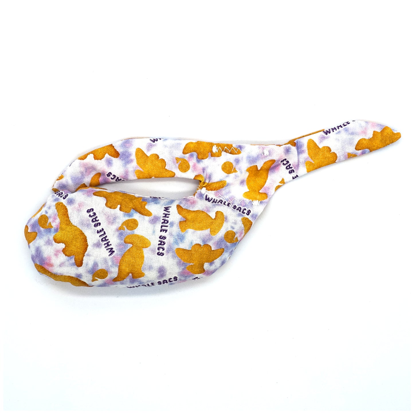 Handmade Whale Sac for disc golf, featuring a Dino Nuggies pattern. Clay-filled dry grip bag for sports, offering eco-friendly hand grip support.